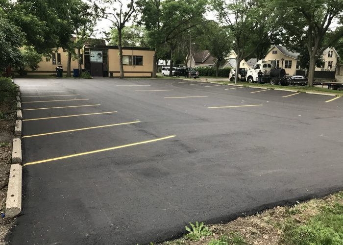 Repairing An Asphalt Parking Lot In Denver With An Asphalt Resurfacing