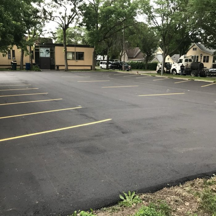 Repairing An Asphalt Parking Lot In Denver With An Asphalt Resurfacing